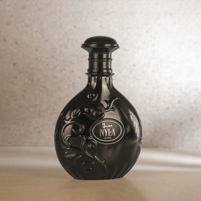 Bottle of Nyla Suede Eau de Parfum from the Arabiyat Prestige collection
